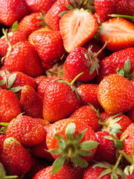 Red ripe strawberries background Close up top view