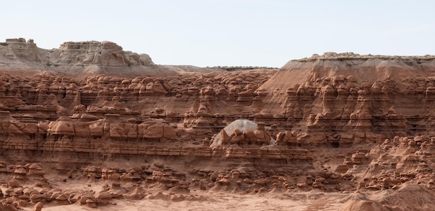 Red Rock Formations and Hoodoos in the Desert at Sunrise