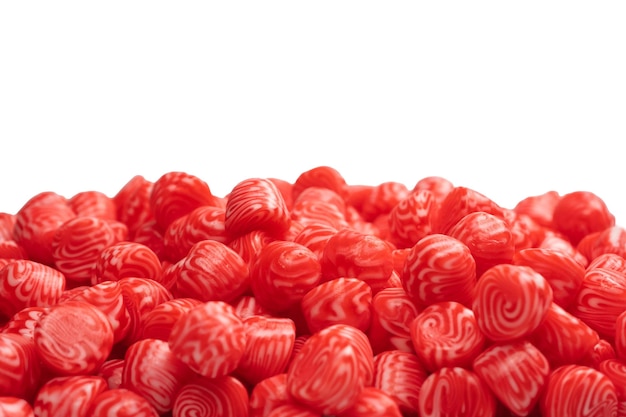 Red round tasty gummy candies islolated on a white background