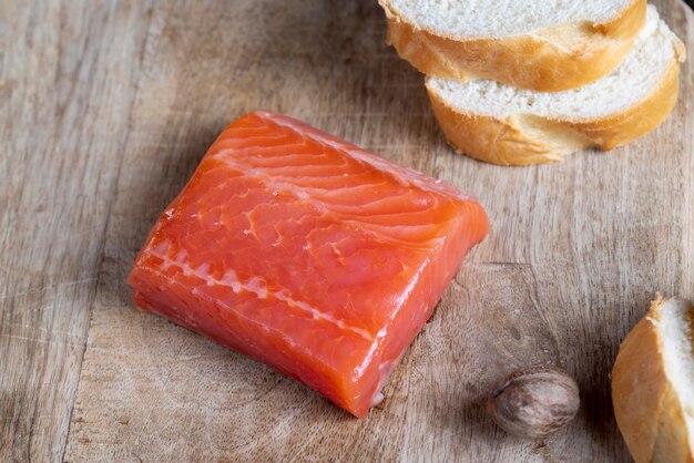 Red salted salmon fish meat on a chopping board