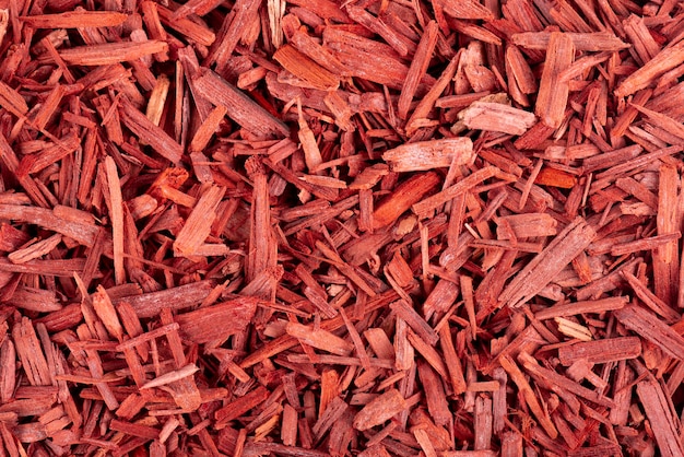 Red Sandalwood incense chips background Sanderswood rubywood or red saunders Top view