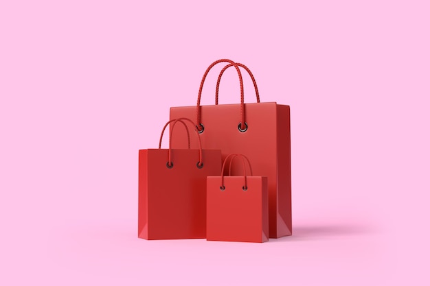 Red shopping bags on a pink background with copy space Creative minimal concept 3D render