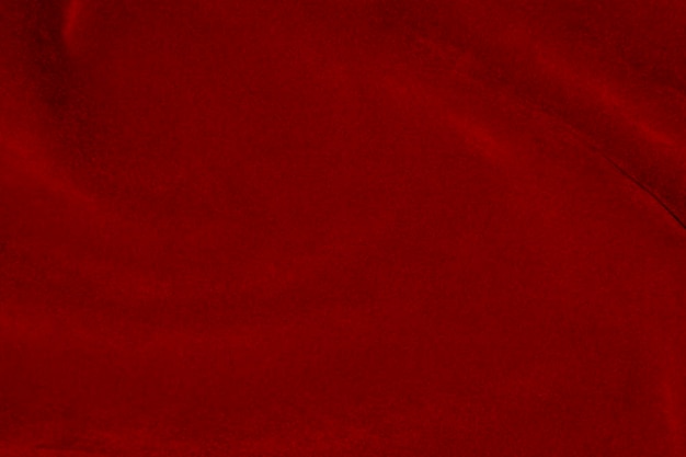 Red silk fabric texture used as background red panne fabric background of soft and smooth textile material crushed velvet luxury scarlet for velvet