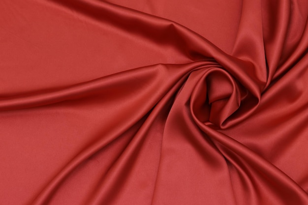 Red silk fabric with a soft, silky finish.