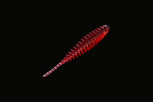 red and silver necklace in a black background