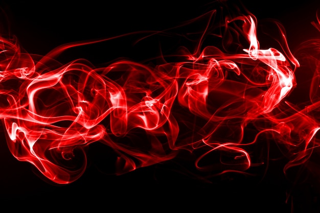 Red smoke abstract isolated on black background, fire design