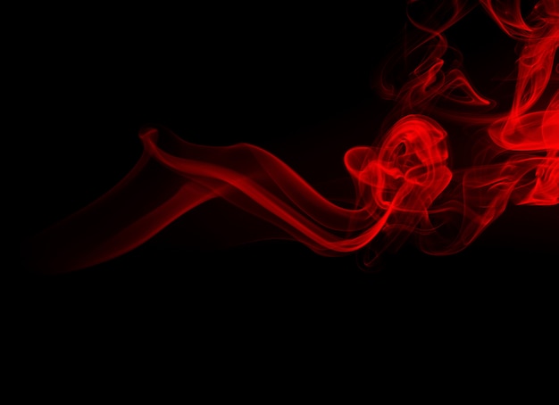 Red smoke on black background, fire design