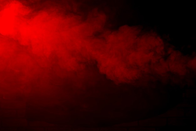 Red smoke on black