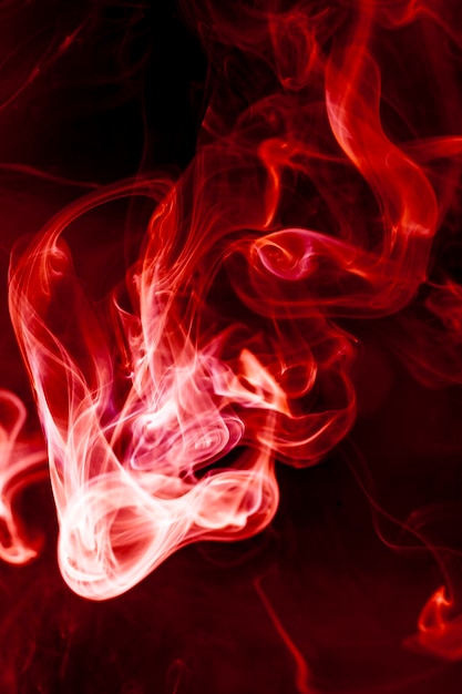 Red smoke motion on black background.