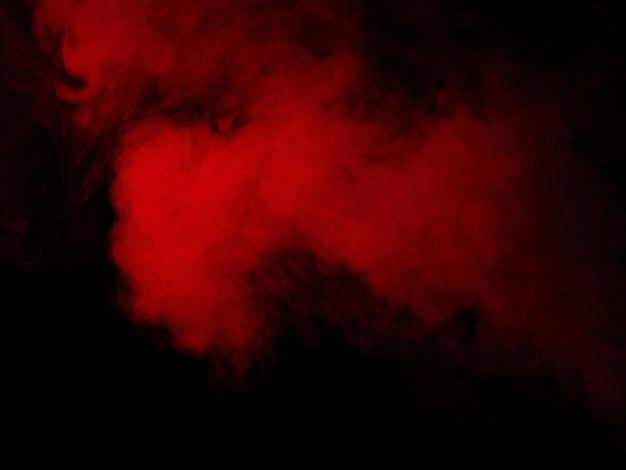 Red smoke texture on black background