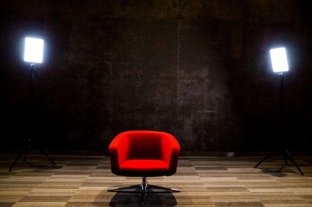 Red sofa with gray background And two LED lights