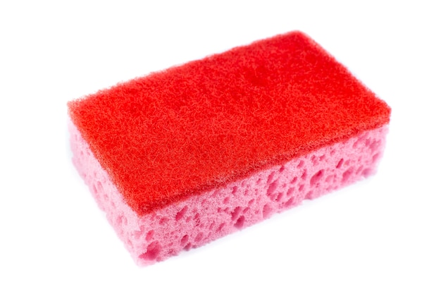 Red sponge for washing dishes on white