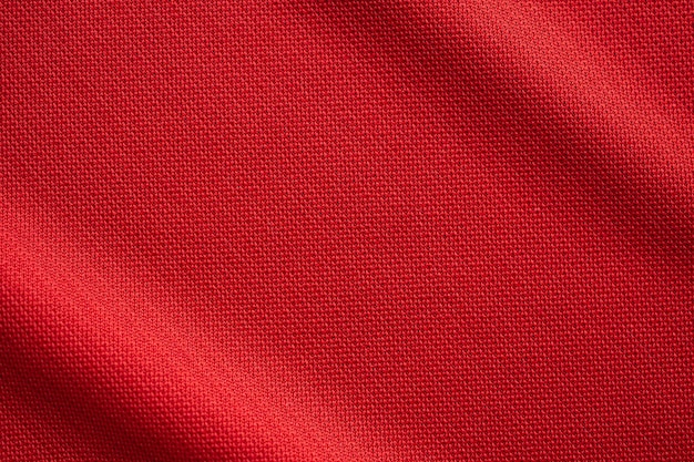 Red sports clothing fabric football jersey texture close up