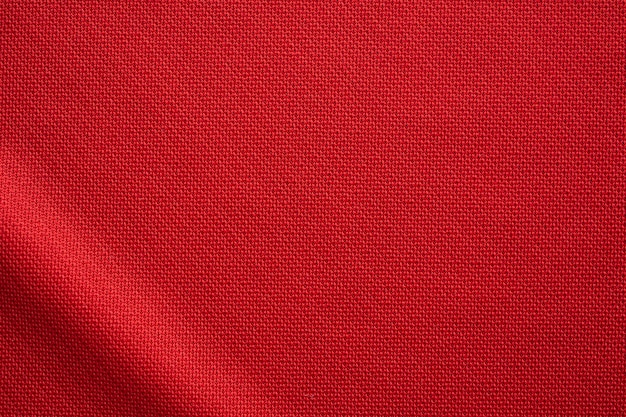 Red sports clothing fabric football jersey texture close up