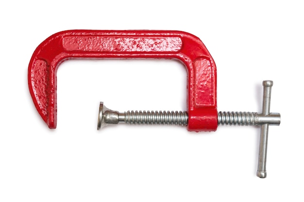 Red steel clamp tool isolated on white background