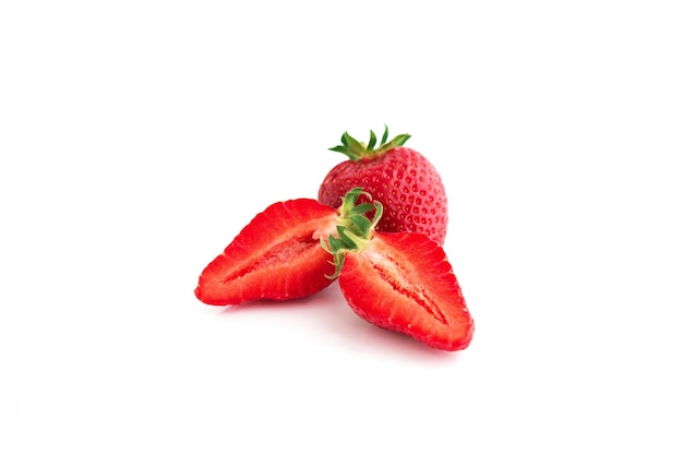 Red strawberries close up on white Isolated on white.