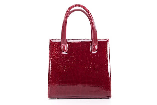 Red stylish ladies leather bag on a white background