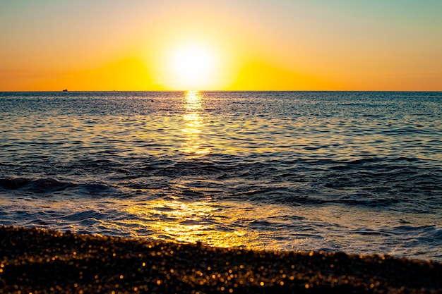 Red sunset over the sea. Beautiful sunset. Tyrrhenian Sea sunset in Calabria, Italy.