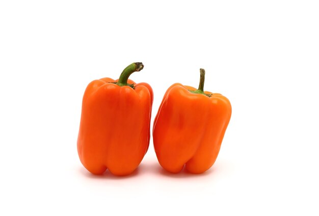 Red sweet peppers on a white background