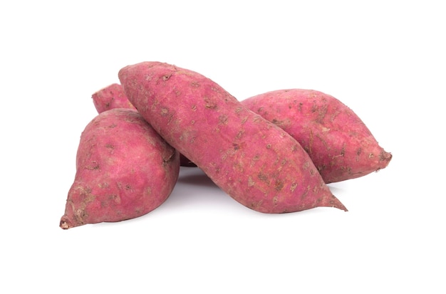 Red sweet potatoes on the white background.