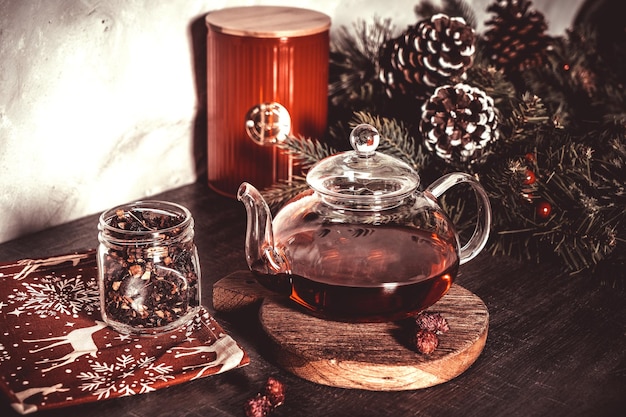 Red tea in a glass teapot