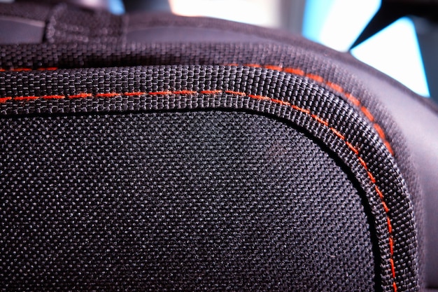 Red thread on travel case object detail