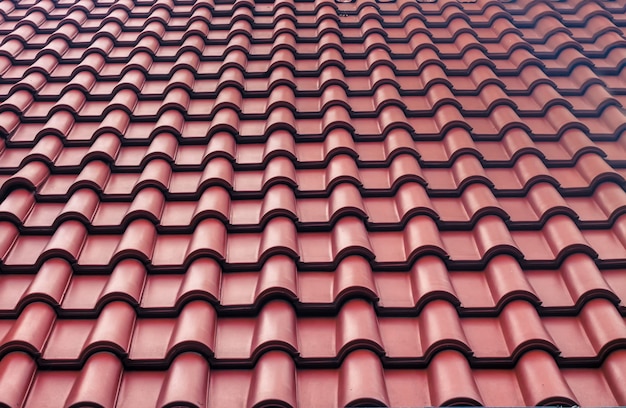 Red tiles roof background