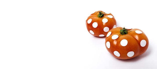 Red tomatoes with white polka dots