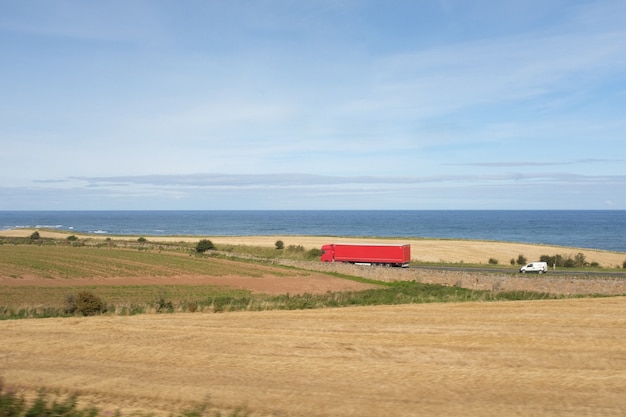 Red truck in a beautiful landscape