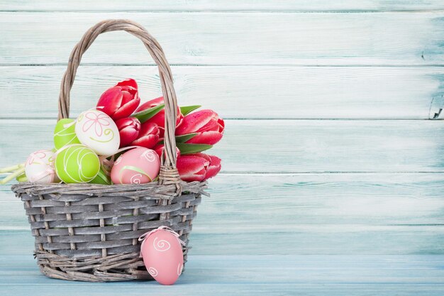 Red tulip flowers and easter eggs