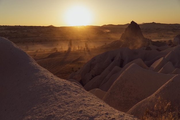 Red valley landscape at sunset with rock formations typical of the Cappadocia area Turkey