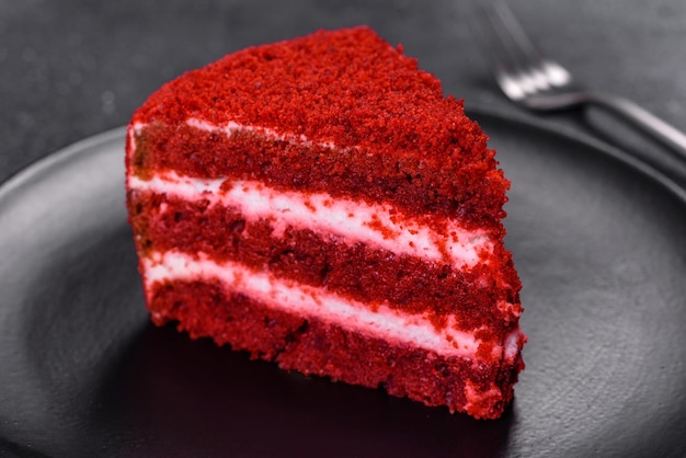 Red velvet cake classic three layered cake from red butter sponge cakes with cream