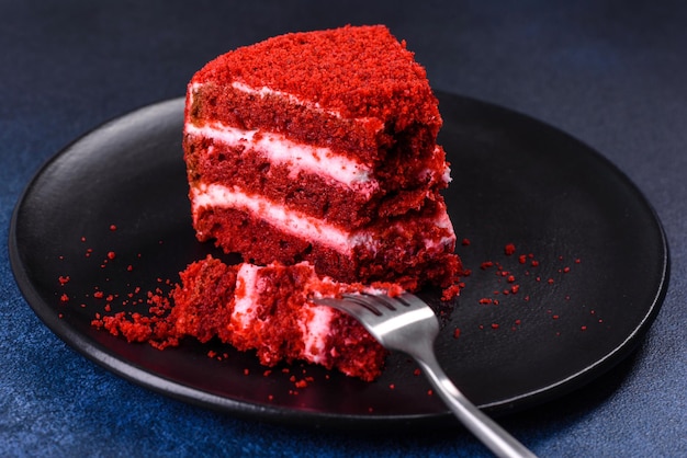 Red velvet cake classic three layered cake from red butter sponge cakes with cream