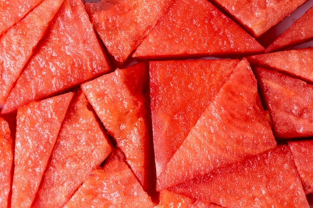 Red watermelon slices texture without seeds top view