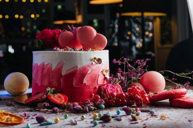 Red white cream cake with roses and hearts