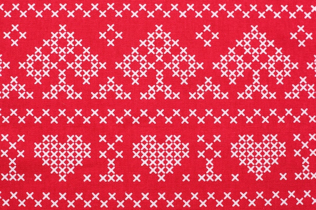 Red and white criss-cross pattern Christmas background