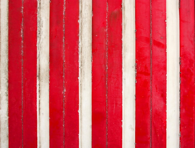 Red and white metal fence background