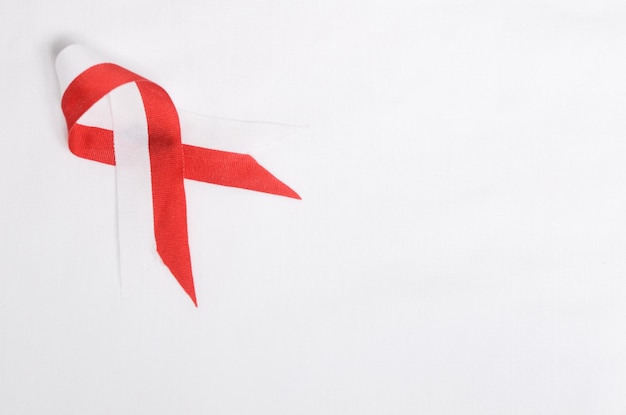 Red and white ribbon with empty space on a white background the concept of celebrating Indonesian independence and Indonesian national day