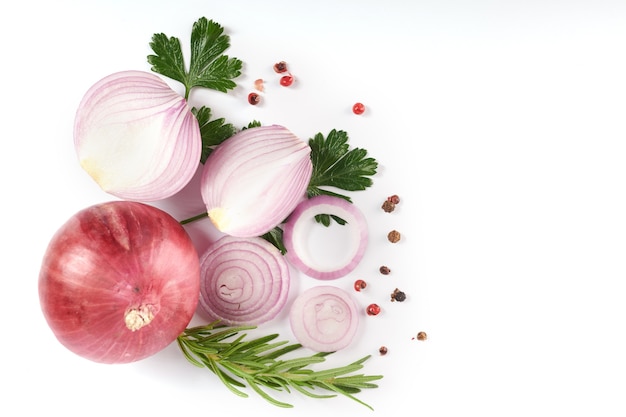 Red whole and sliced onion, Fresh onion isolated on white surface with clipping path. Sliced red onion with parsley on the white.