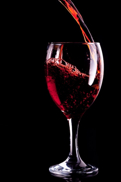 Red wine being poured into glass