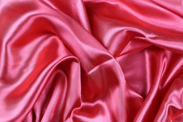 Red wrinkled cloth background for design in your work concept.