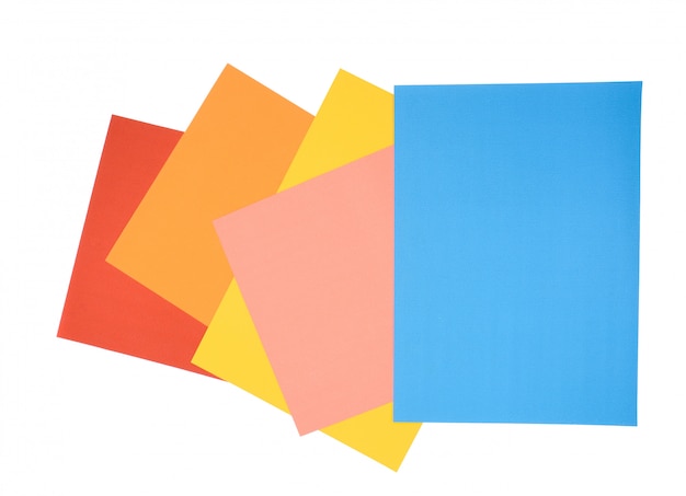 Red, yellow, pink, blue and orange paper isolated on white