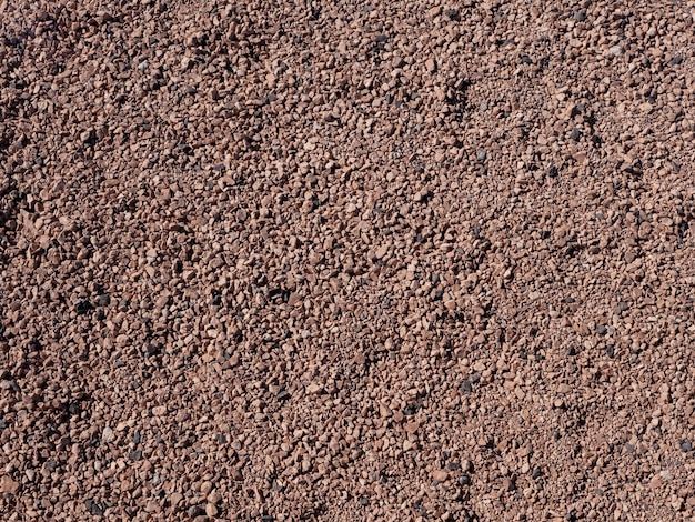 Reddish gravel floor texture background