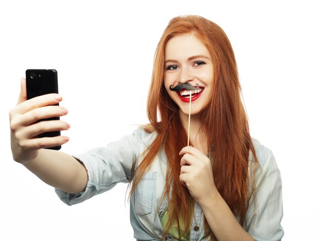 Redhair girl ready for party, take selfie