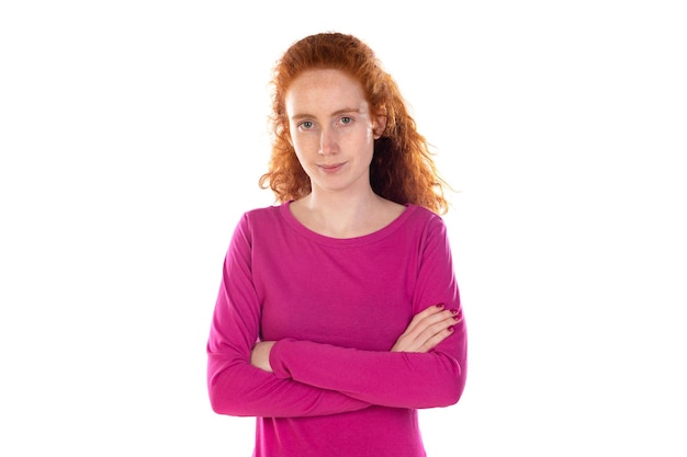 Redhaired young woman wearing a pink tshirt