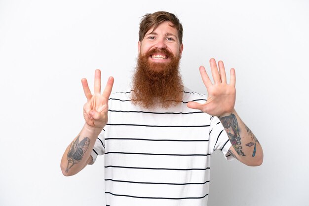 Redhead man with beard isolated on white background counting eight with fingers