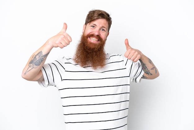 Redhead man with beard isolated on white background giving a thumbs up gesture