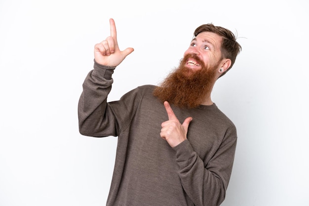 Redhead man with beard isolated on white background pointing with the index finger a great idea