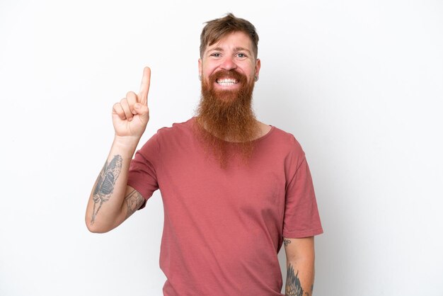 Redhead man with long beard isolated on white background pointing up a great idea