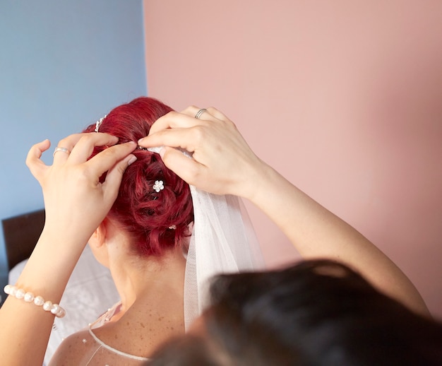 Redhead woman in the hairdressing salon